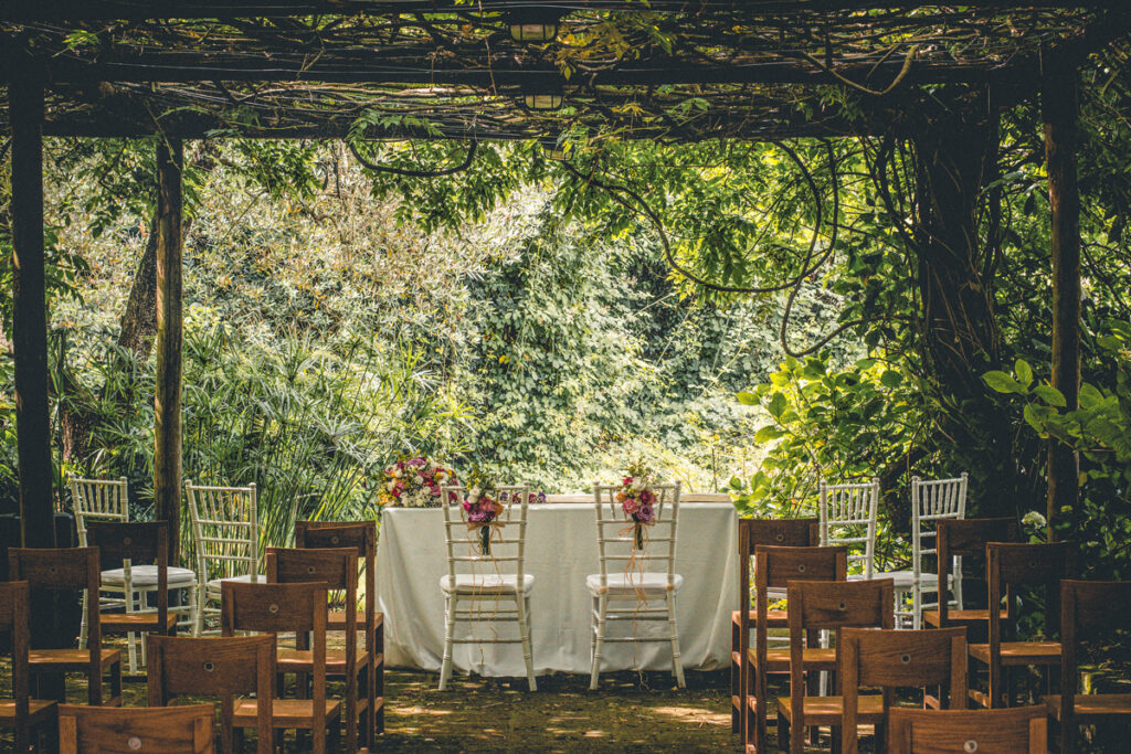 Wedding location, pergola and chairs decorated for the wedding