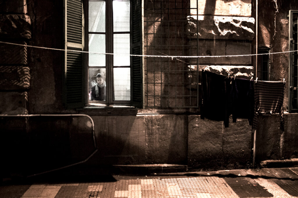 woman at the window, anti-violence center for women, LuchaySiesta