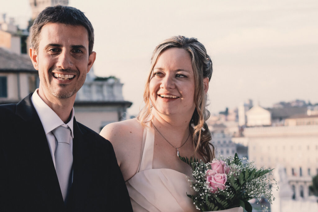 the newlyweds smiling