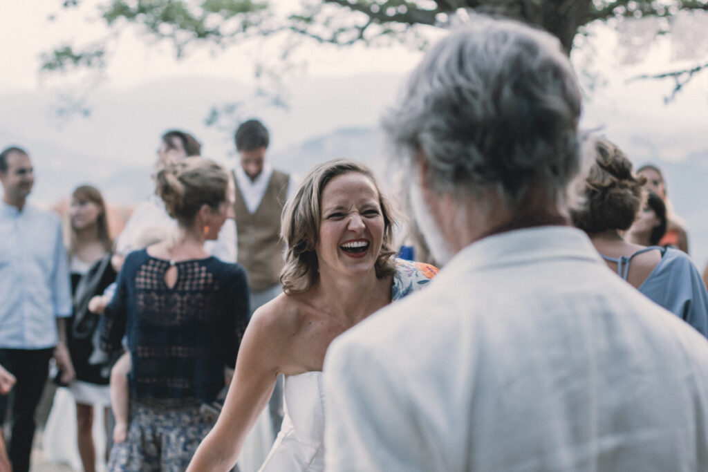 The bride dances happy with daddy