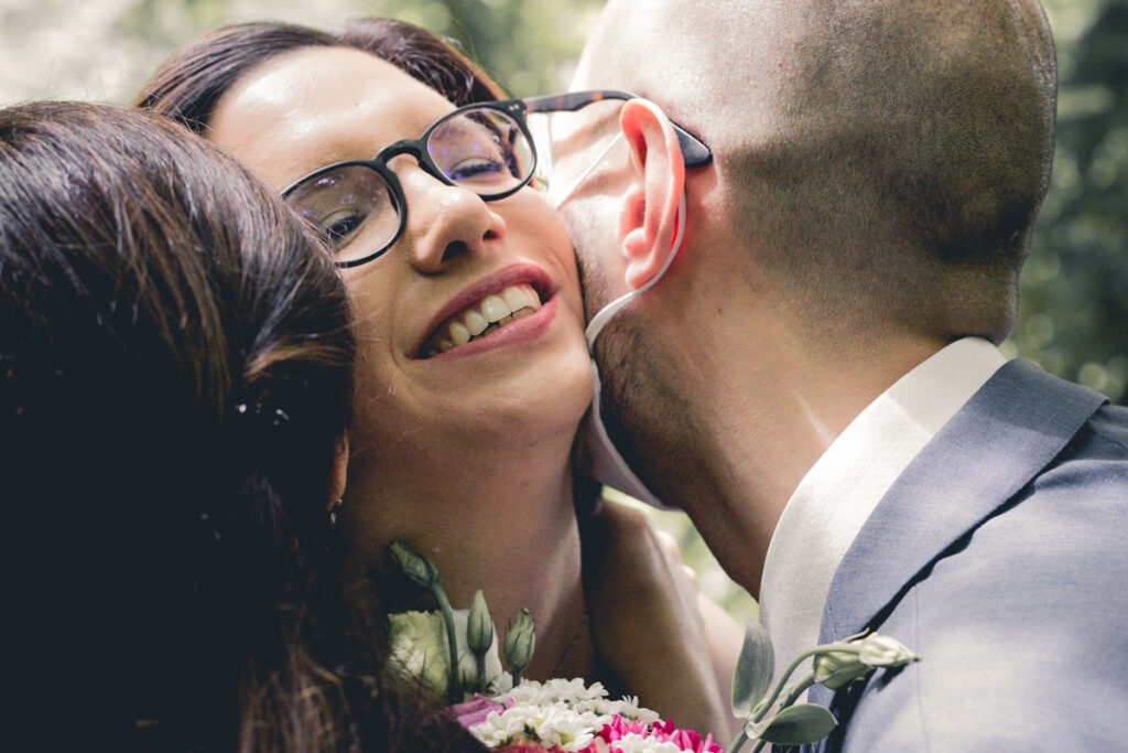 The bride kisses her guests